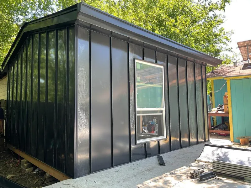 Black standing seam metal wall panels for Metal Roof Installation in Pocahontas